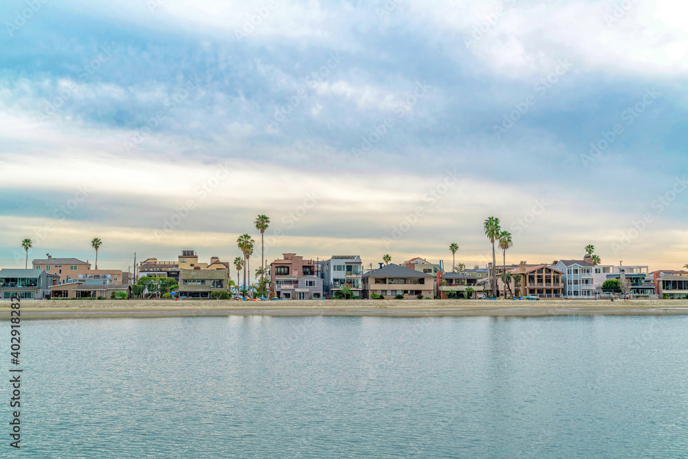 Scenic coastal neighborhood scenery in Long Beach California against cloudy sky