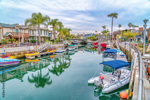 Small boats and boats with pedals at the docks of canal in Long Beach California