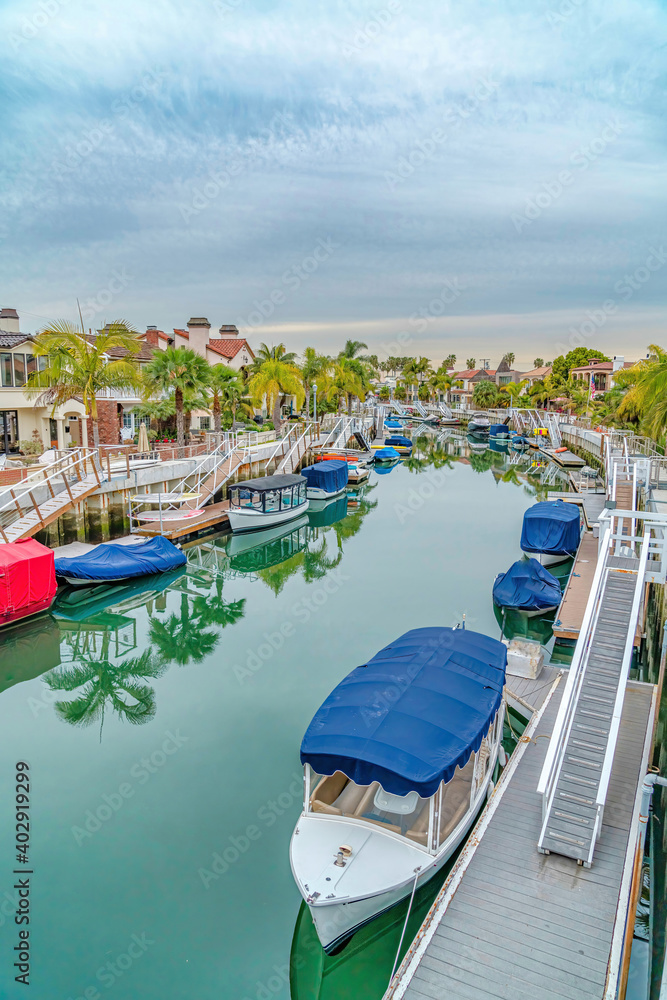 Aerial view of canal with stairs and boat docks in scenic Long Beach California