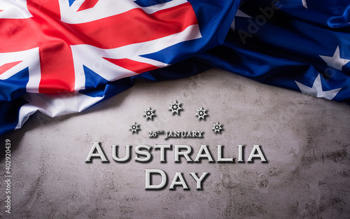 Happy Australia day concept. Australian flag against old stone background. 26 January.