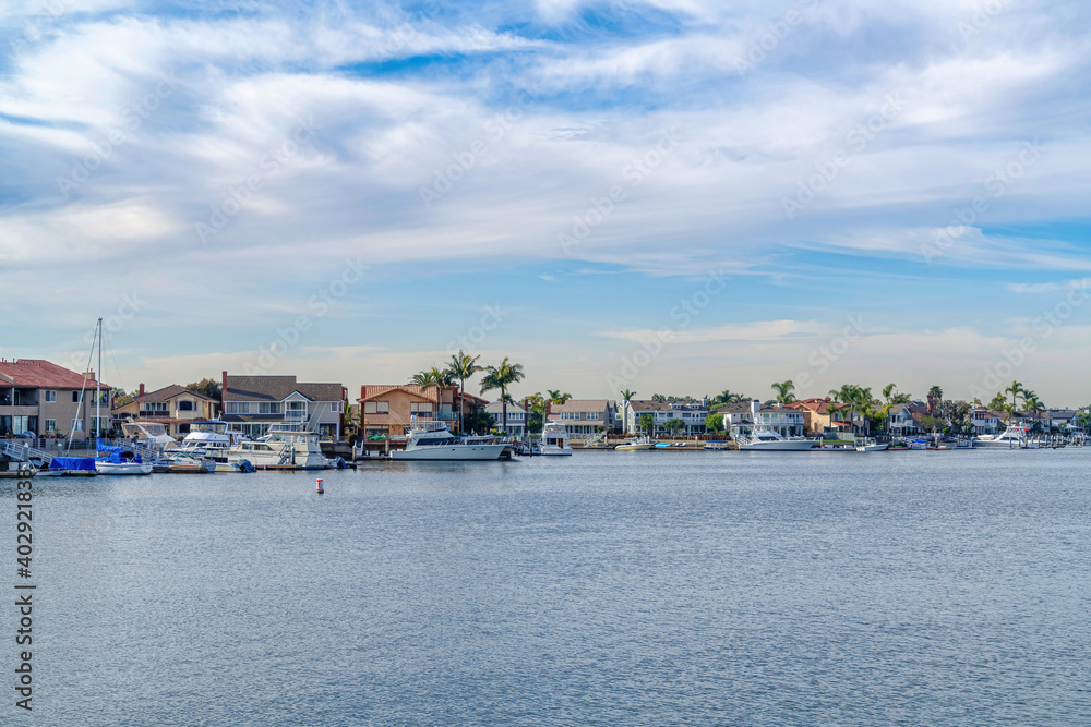 Scenic panoramic view of the sea with harbor and houses in Huntington Beach CA