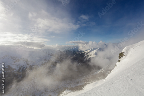 Low clouds over Tatry mountains during winter, Poland