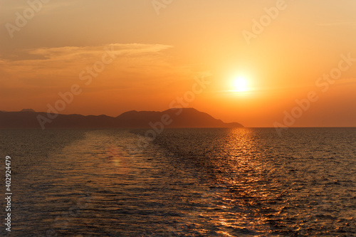 sunset over the sea ,Deniz üzerinde günbatımı , günbatımı , Gemide günbatımı , Gemide adaya karşı gün batımı 