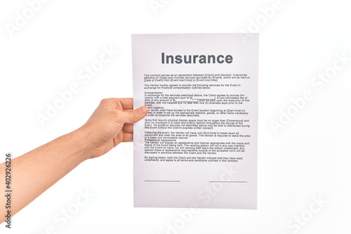 Holding Insurance paper form over isolated white background