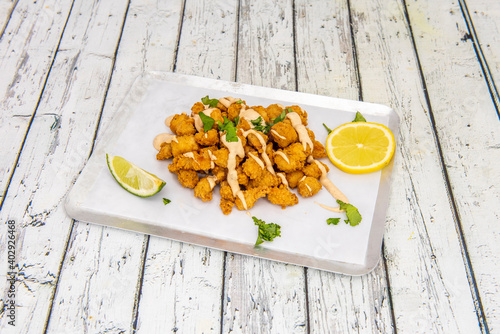 chicken popcorn on white table