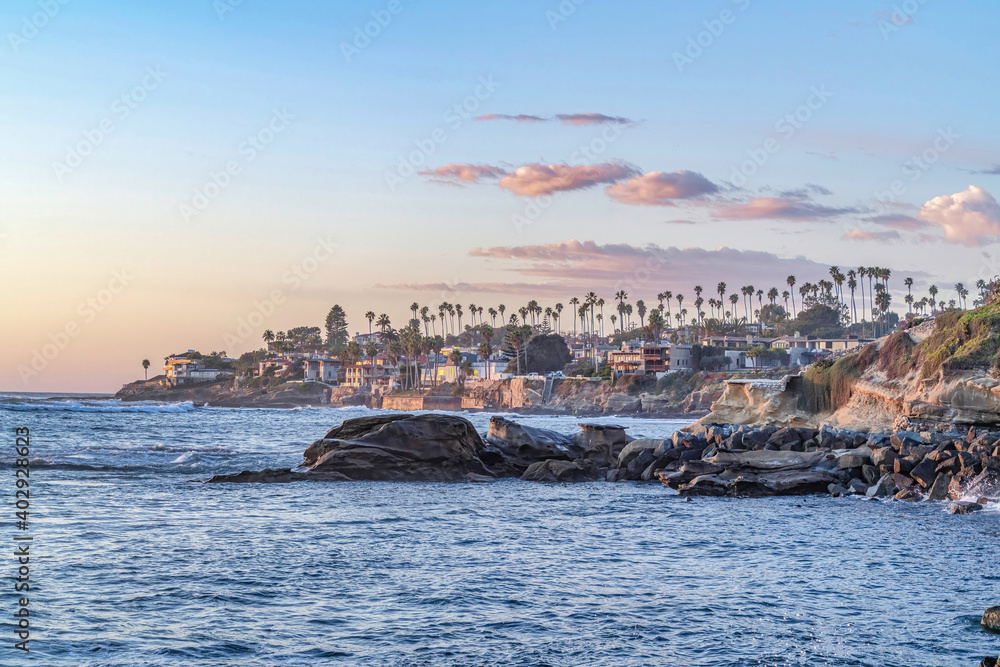 Ocean and cloudy sky at the picturesque coast of San Diego California at sunset
