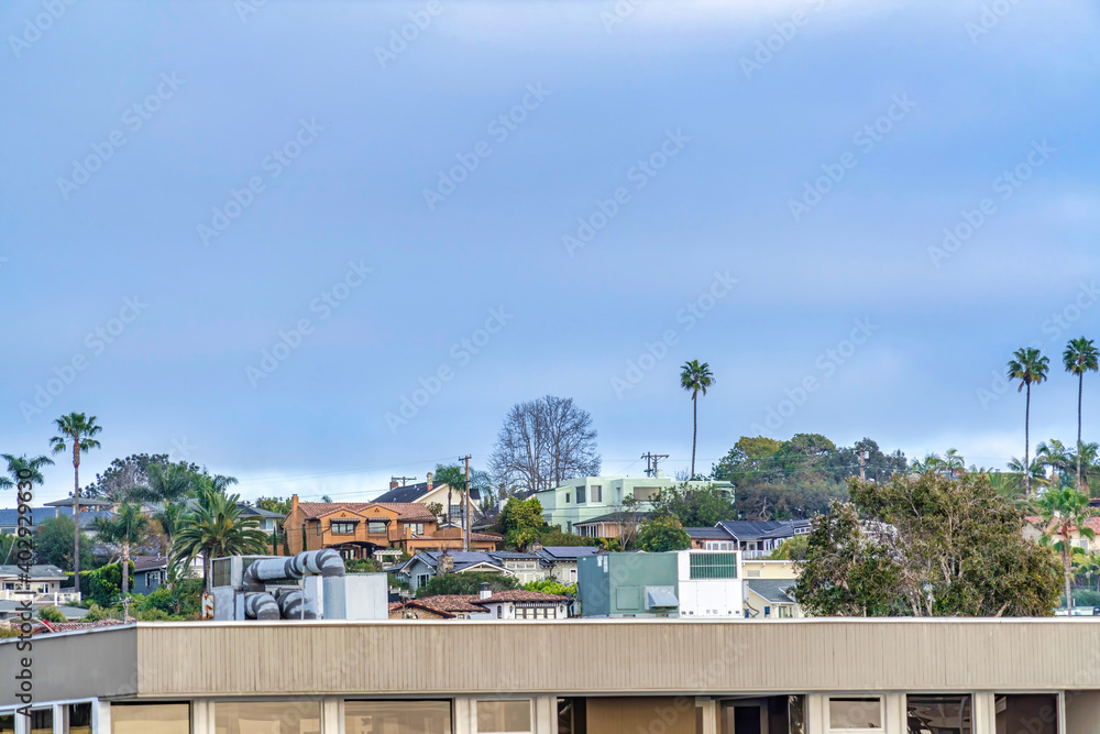 San Diego California neighborhood landscape with buildings against blue sky
