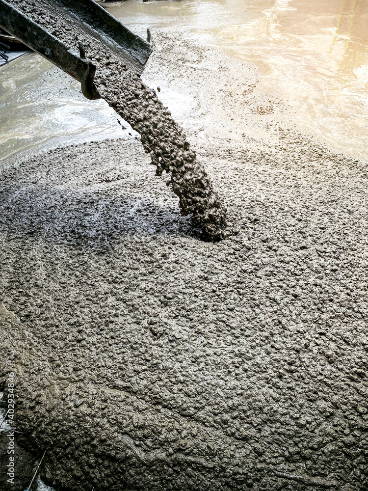 Pouring readymixed concrete after placing steel reinforcement
