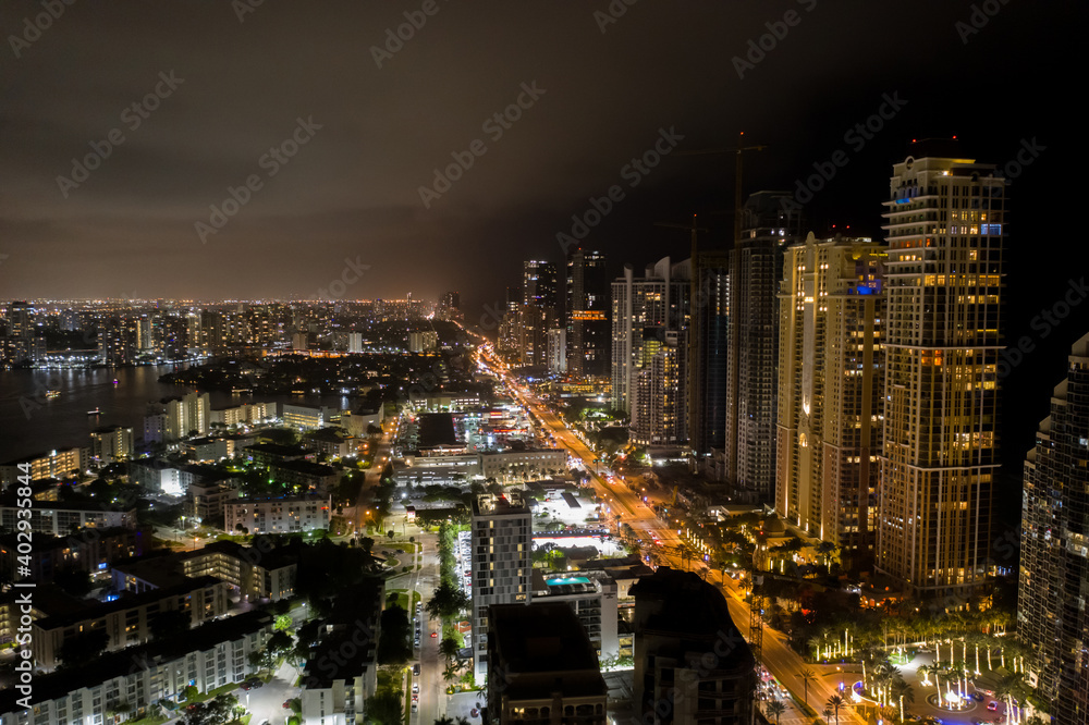 Night aerial photo Sunny Isles Beach FKL city lights Night aerial photo Sunny Isles Beach FKL city lights