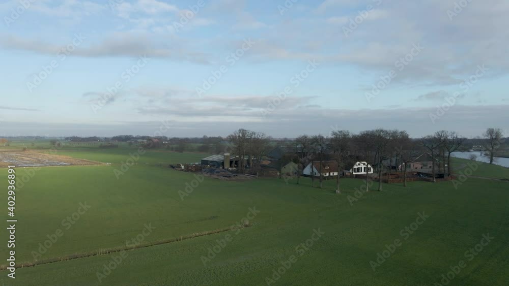 Aerial of beautiful farm near river on a sunny autumn day Aerial of beautiful farm near river on a sunny autumn day
