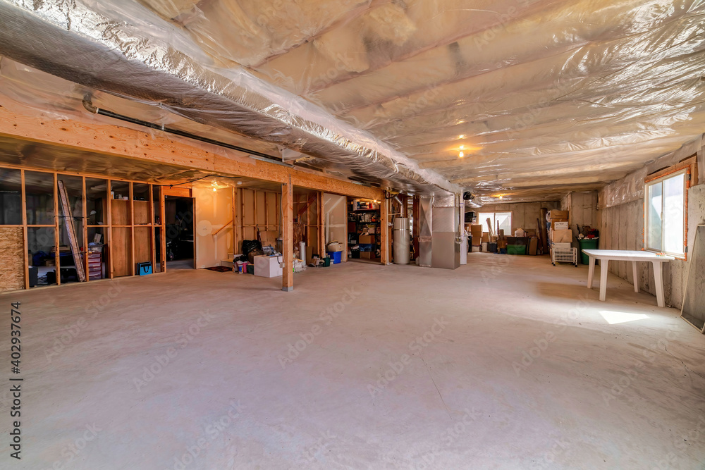 Interior view of a house under construction with plastic cover on the ceiling