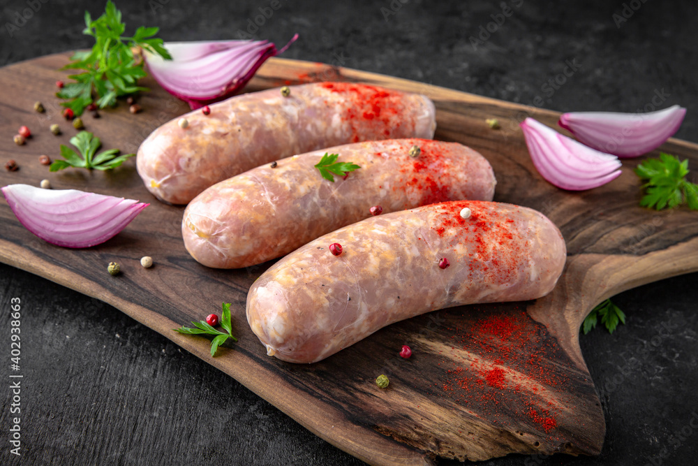 Pork or chicken sausages. Fresh raw meat prepared for cooking. Pork or chicken sausages. Fresh raw meat prepared for cooking.