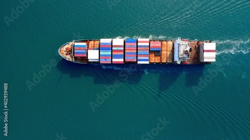 4k 60fps huge cargo ship crossing the ocean photo