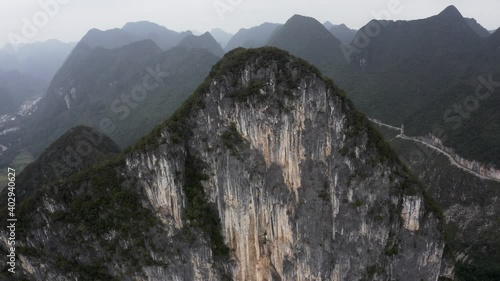 Steep karst mountain rock face, Getu Valley rock climbing region, China, aerial photo