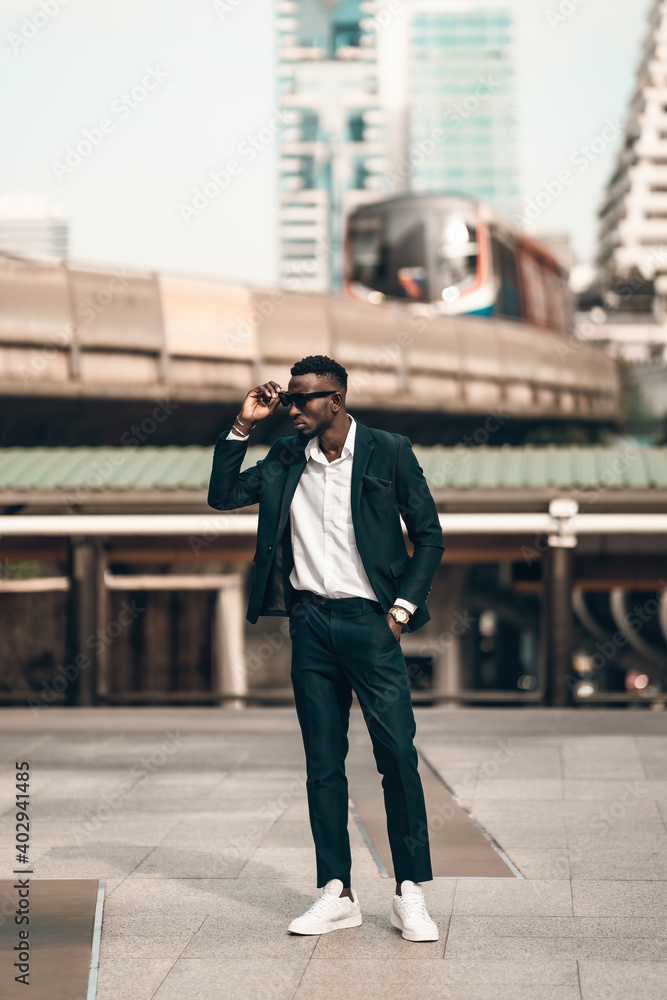 portrait of successful african businessman outdoor in modern city portrait of successful african businessman outdoor in modern city