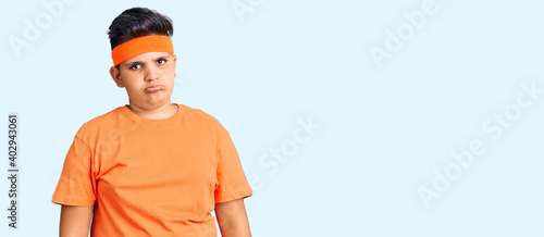 Fotografering Little boy kid wearing sportswear depressed and worry for distress, crying angry and afraid