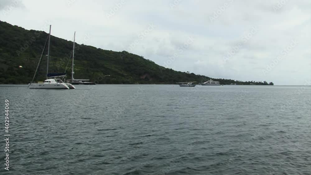 Yachts in the bay of Moorea island, French Polynesia. Yachts in the bay of Moorea island, French Polynesia.