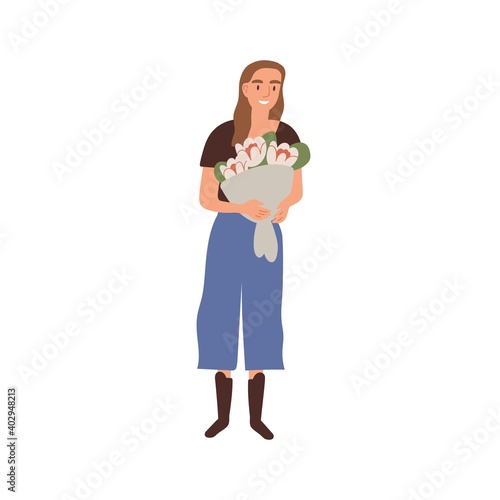 Portrait of happy woman holding bouquet of beautiful natural fresh flowers ve...