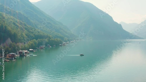 Wallpaper Mural Boat cottages by the mountain riverbanks of Perućac, Serbia - Aerial Torontodigital.ca