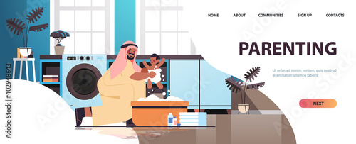 arab father bathing little son in small bath tub fatherhood parenting concept dad spending time with baby at home bathroom interior full length horizontal copy space vector illustration