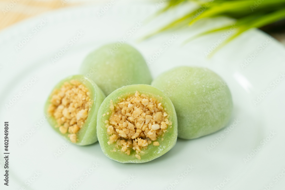Chinese dessert or sweet mochi with ground peanut and sugar filling