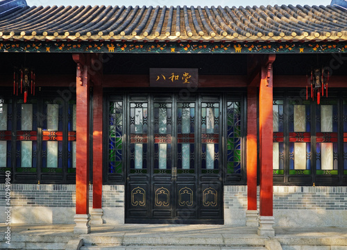 Chinese traditional wooden ornamented doors, the sample of Lingnan architectural style.   TRANSLATION: Bahe Hall             photo
