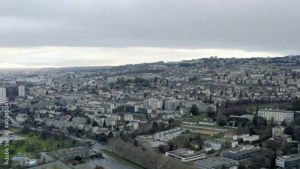 Drone Aerial of the beautiful swiss city center of lausanne located on the lake geneva (lac léman) in Switzerland during winter, Europe. Drone Aerial of the beautiful swiss city center of lausanne located on the lake geneva (lac léman) in Switzerland during winter, Europe.