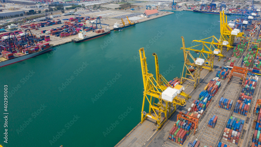 Container ship terminal, and quay crane of container ship at industrial port with shipping container vessel, Maritime cargo freight ship import export business service logistic international.