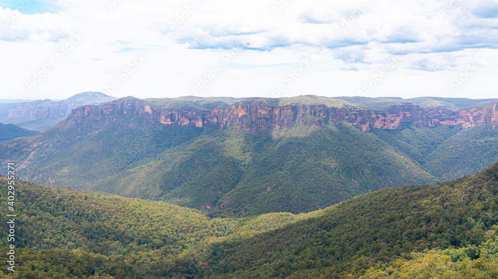 Landscape View of the Blue Mountains National, Park,NSW,Australia,  from the popular tourist site of Govett's Lookout showing the Grose River Valley and the sandstone cillffs with cloudy day.