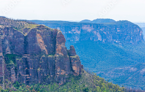 Landscape of the Blue Mountains National Park,Australia,from the popular tourist site of Govett's Leap lookout showing Pulpit Rock and the sandstone cliffs of the Grose River Valley.