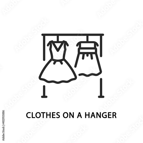 Clothes on a hanger floor flat line icon. Dress and skirt waiting for try on.