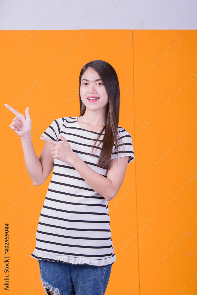 Young Asian Girl Lifestyle Happy Asian Girl On Yellow Background Young Asian Girl Lifestyle Happy Asian Girl On Yellow Background
