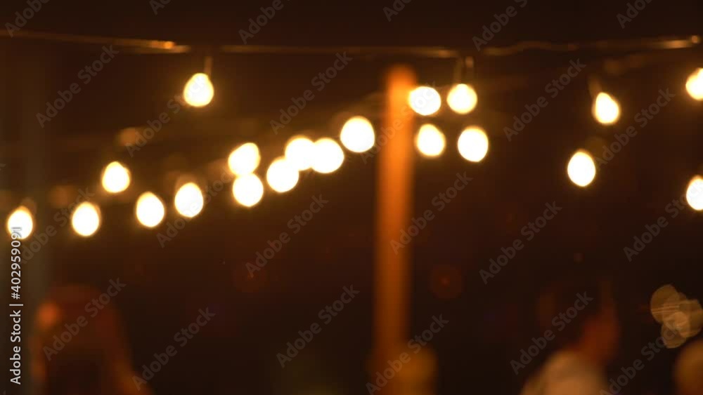Blurred image of wedding decor with lights. Blurred image of wedding decor with lights.