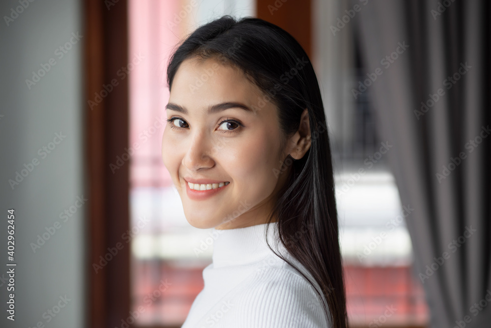 face portrait of happy smiling asian woman, portrait of positive confident happy smiling asian woman smiles in urban indoor environment, young adult Chinese asian woman model face portrait of happy smiling asian woman, portrait of positive confident happy smiling asian woman smiles in urban indoor environment, young adult Chinese asian woman model