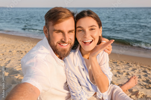 Happy young couple taking s...