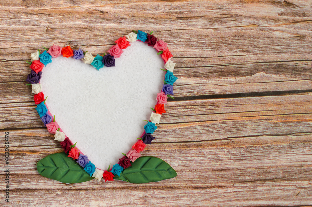 Blank greeting card. Heart-shaped card with flower frame.
Blank greeting card. Heart-shaped card with flower frame.