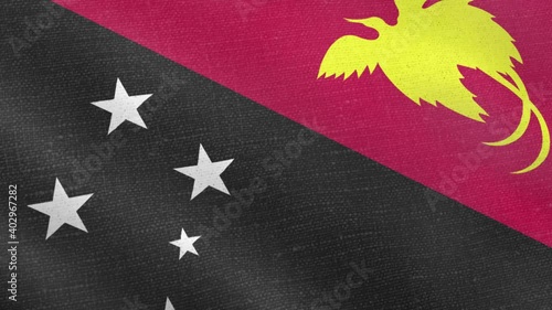 Papu New Guinea flag wind blowing full frame background photo