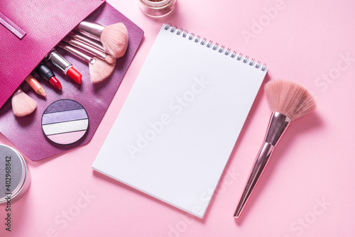 Paper notebook flat lay mock up on pink cosmetic table