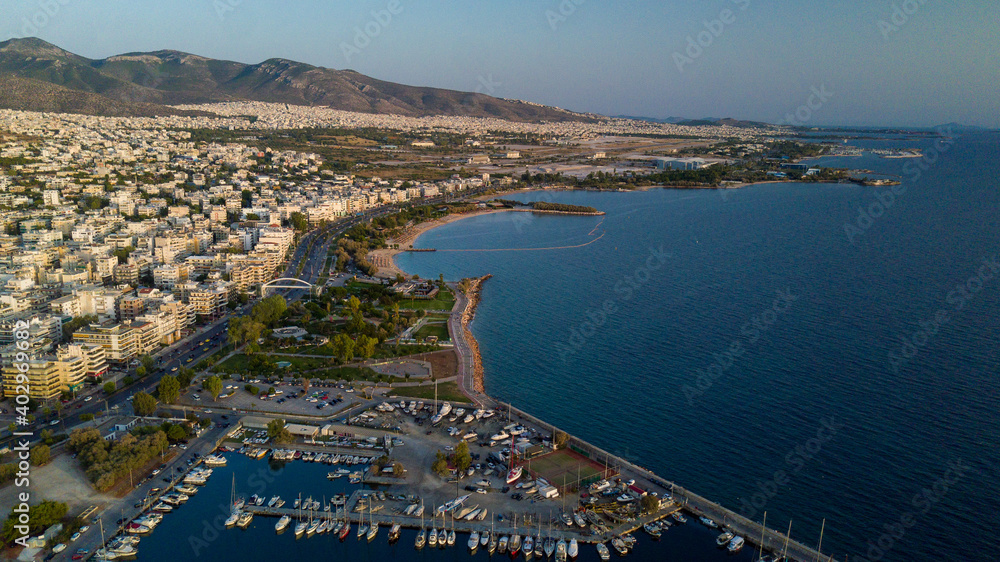 Aerial drone bird's eye view of marina in Athens with docked yachts, Piraeus Harbour port of Athens