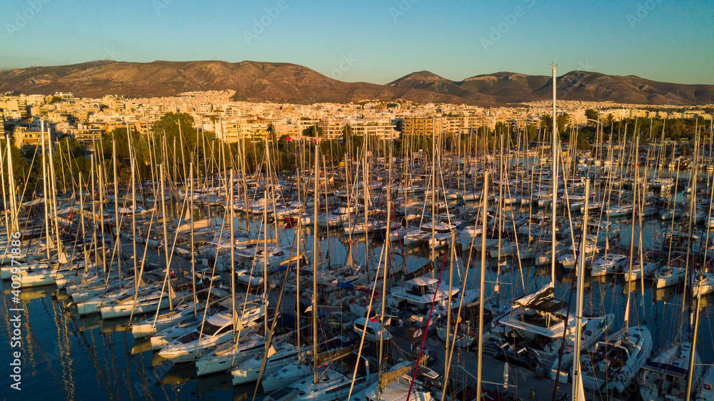 Fototapeta premium Aerial drone bird's eye view of marina in Athens with docked yachts, Piraeus Harbour port of Athens