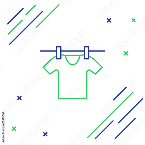 Line Drying clothes icon isolated on white background. Clean shirt. Wash clothes on a rope with clothespins. Clothing care and tidiness. Colorful outline concept. Vector.