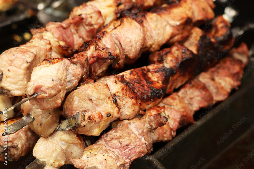 Kebab on the grill, meat cooking on charcoal