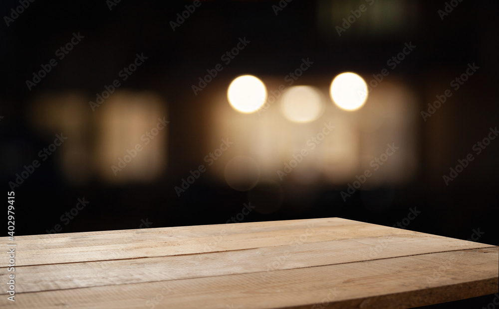 empty table on dark background with blurred lamps, cafe restaurant bokeh for your product or customization empty table on dark background with blurred lamps, cafe restaurant bokeh for your product or customization