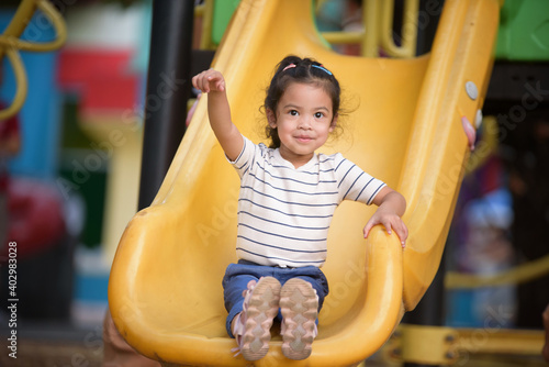 Little children having fun in the playground