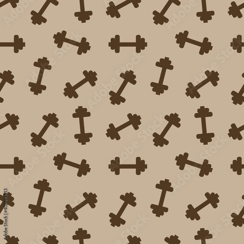 Dumbbells for sports on a brown background.