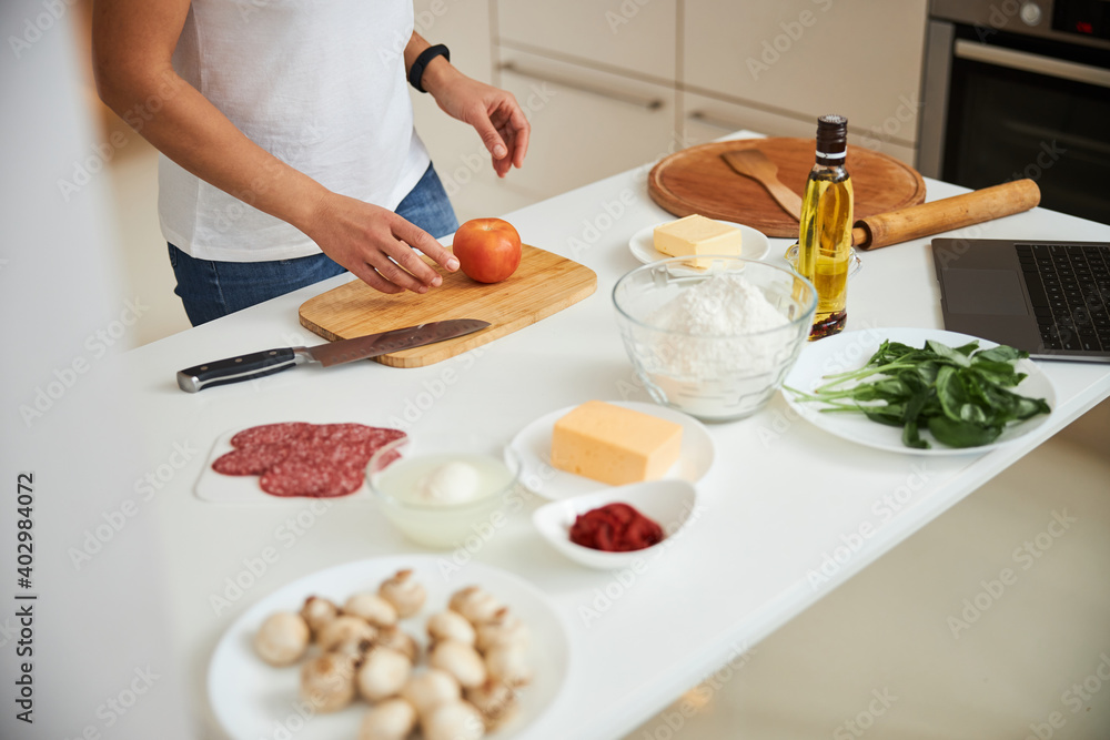 Using fresh ingredients for homemade dinner in the kitchen