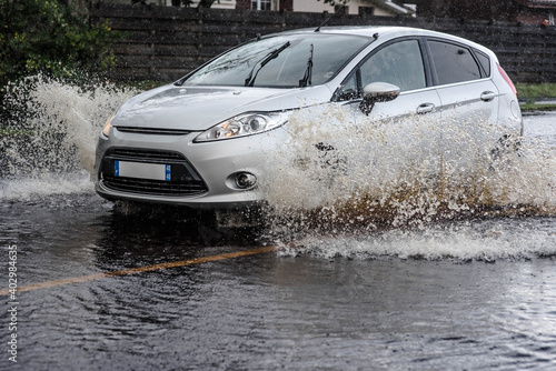 car driving on flooded roads © Image'in