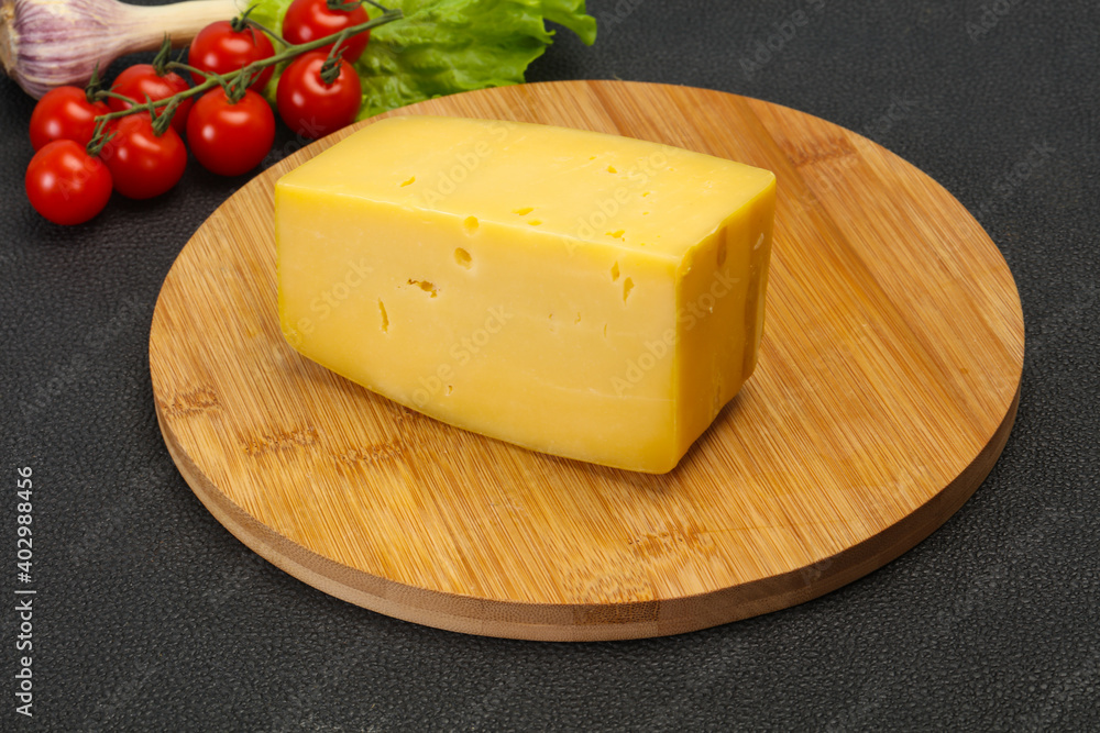 Hard yellow tasty cheese brick Hard yellow tasty cheese brick