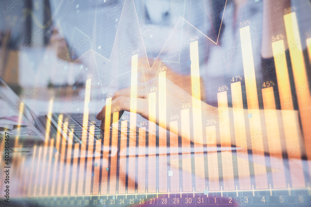 Multi exposure of woman hands typing on computer and financial graph hologram drawing. Stock market analysis concept. Multi exposure of woman hands typing on computer and financial graph hologram drawing. Stock market analysis concept.