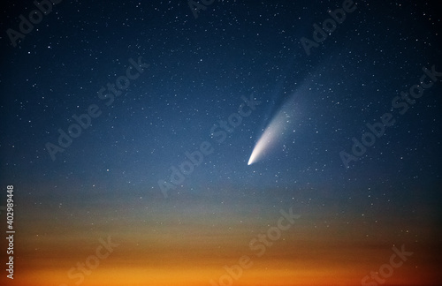 Wonderful view of starry sky and C/2020 F3 (NEOWISE) comet with light tail. photo